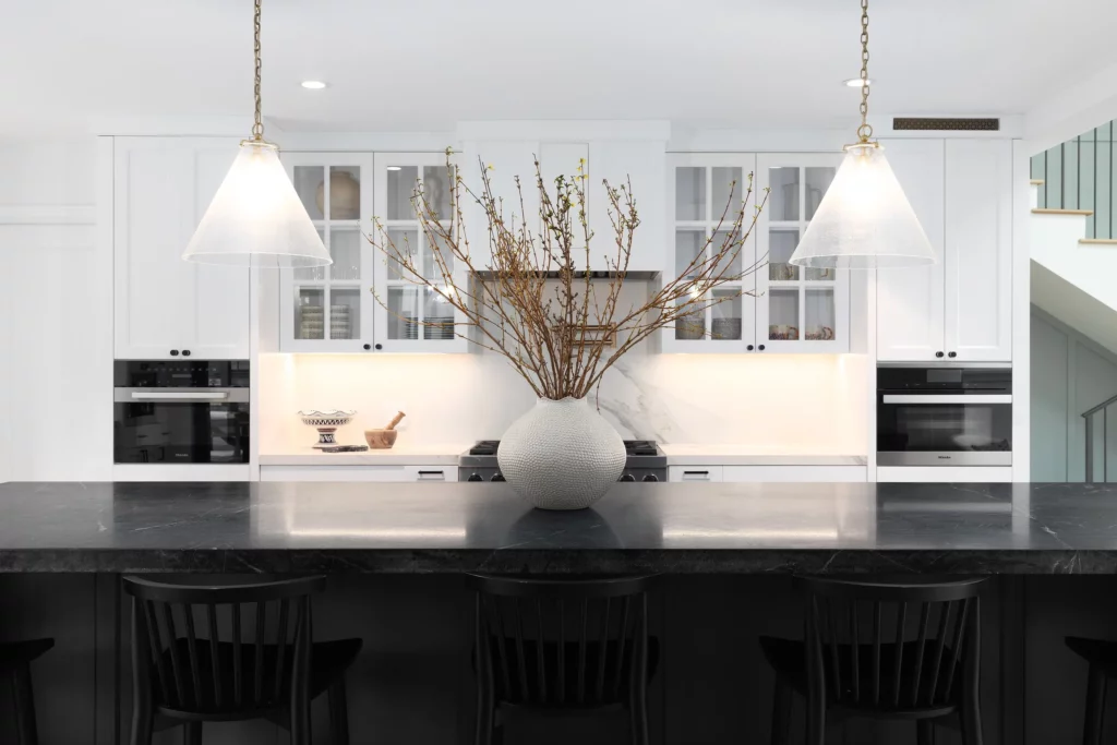 Modern kitchen remodel with white cabinets and granite countertops in Redwood City home